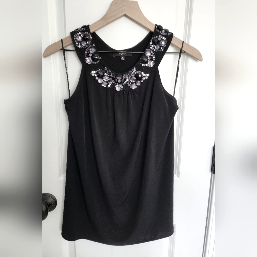 Express top with rhinestone neckline